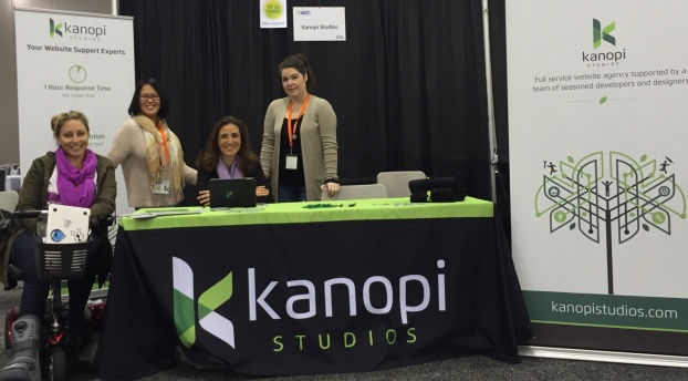 Four Kanopians at the Kanopi booth at NTC 2016 in San Jose. 