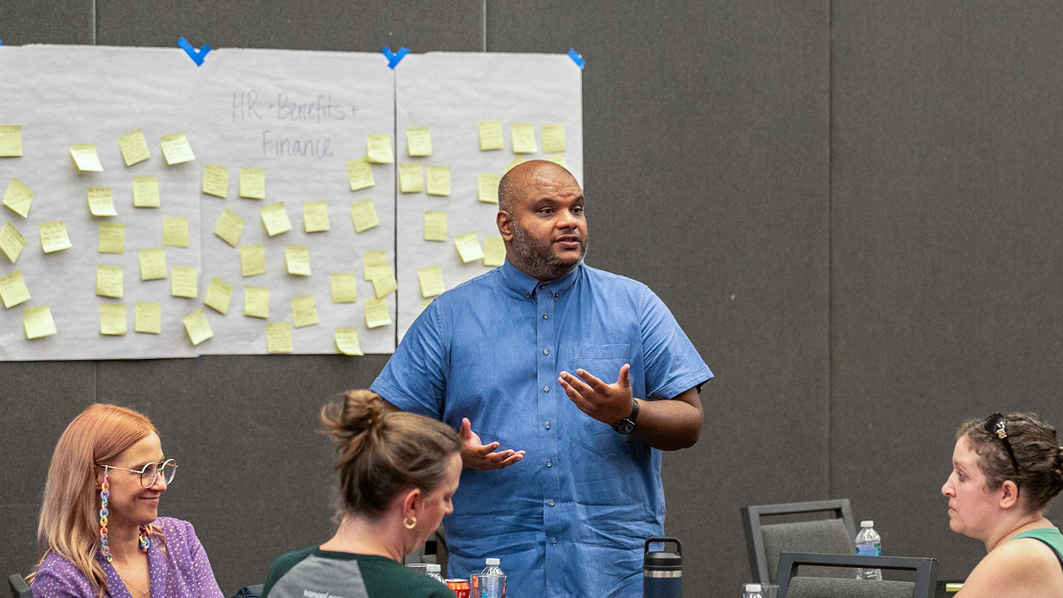 Kanopi Studios team meeting discussing creative ideas and strategy.