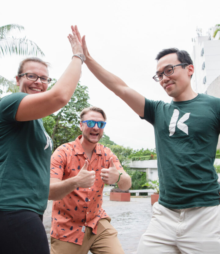 Kanopi's Jen Hill, Tim Tufts, and Joe Tuen giving high fives and thumbs up.