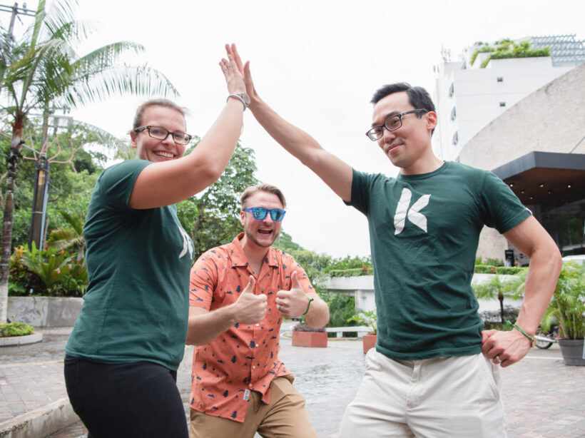 Kanopi's Jen Hill, Tim Tufts, and Joe Tuen giving high fives and thumbs up.